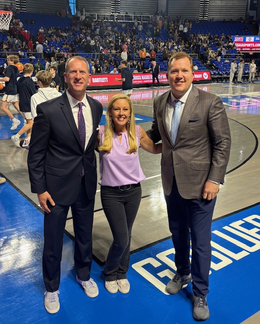 Kevin Maggard, Dawn Davenport, and Jeff Hem on the basketball court